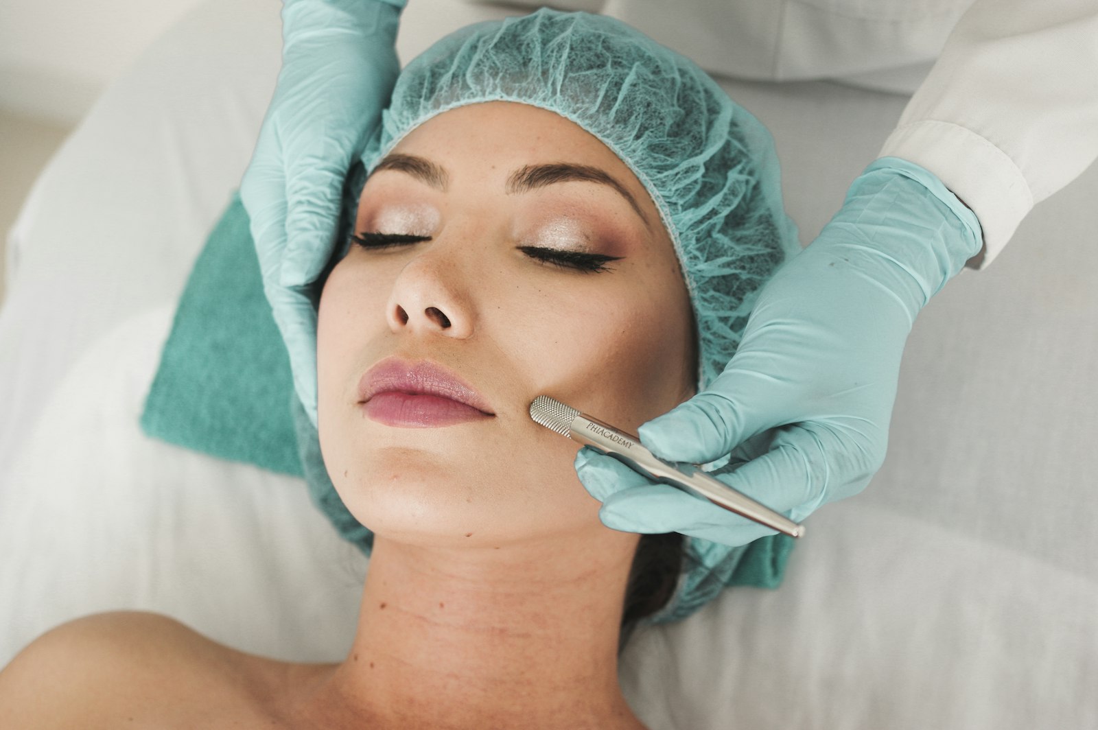 Client receiving a beauty treatment with eyes closed
