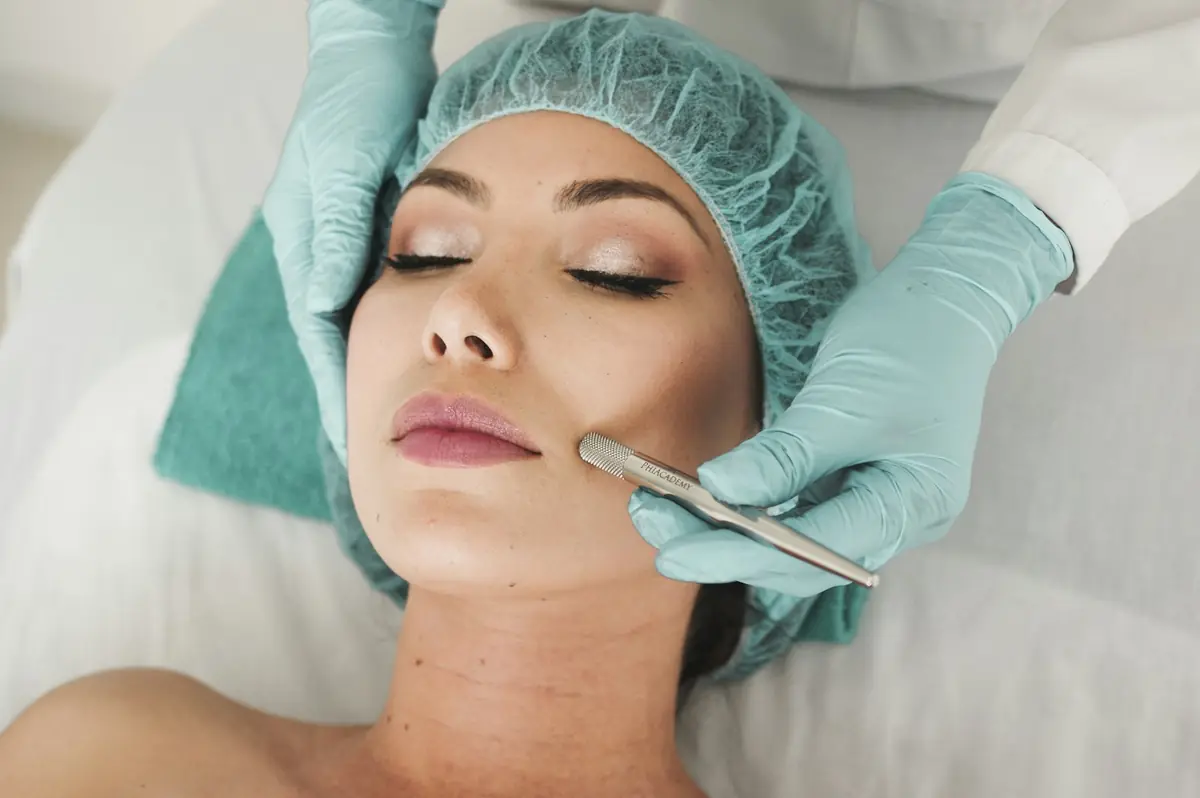 Client receiving a beauty treatment with eyes closed
